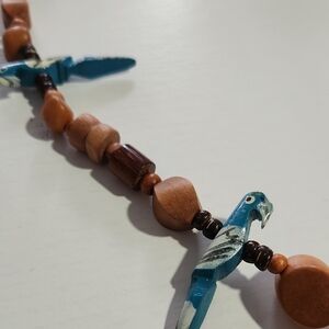 Wooden Beaded Necklace with Blue Parrot Accents
